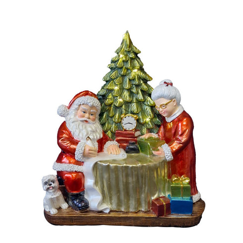 MR & Mrs Santa working on their christmas lists with Christmas Tree with LED lights.